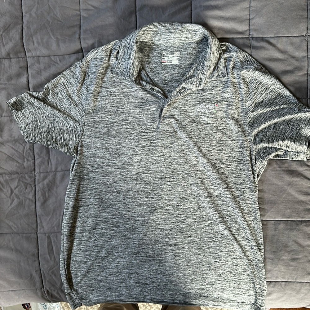 Under Armour heat gear loose fit golf polo size large.